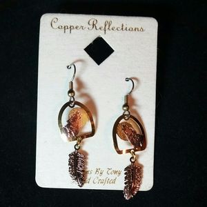 Howling Wolf Earrings with Dangle Feather